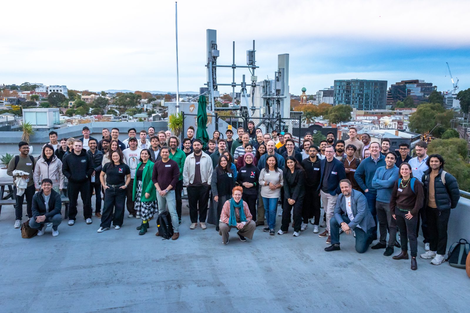 The Claude Impact Lab room at Inspire9, Richmond — Melbourne skyline behind